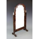 A 1920's Queen Anne design tortoiseshell and ivory dressing table mirror,