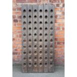 A late 19th century French sixty section oak bottle rack,