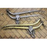 A pair of cast iron hames, the hooks struck with a lion passant, 74cm,