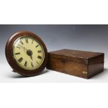 A circular postmans wall clock, with pendulum,
