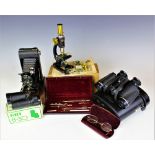 A selection of items to include a pair of Pentax Asahi binoculars, a USSR MN monocular,