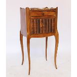 A late 19th century French kingwood and walnut bedside cupboard,