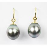 A pair of untested pearl set drop earrings,