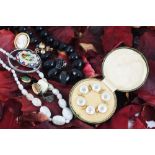 A collection of jewellery, to include; a cased button set,