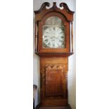 An early 19th century inlaid oak eight day longcase clock,