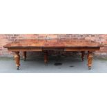 A large and impressive Victorian mahogany extending dining table,