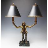 A modern twin light table lamp modelled as a monkey in a fur coat,