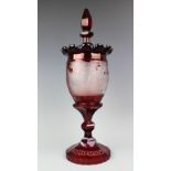 A 19th century Bohemian ruby flashed glass goblet and cover,