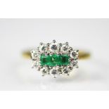 An emerald and diamond ring,