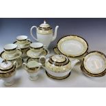 A Wedgwood Cornucopia pattern tea service comprising; a coffee pot and cover, teapot and cover,