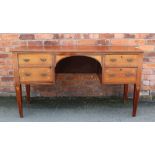 A 19th century inlaid mahogany side table, with cupboard door and two drawers, on tapered legs,
