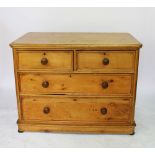 A Victorian pine chest, of two short and two graduated long drawers, on turned legs,