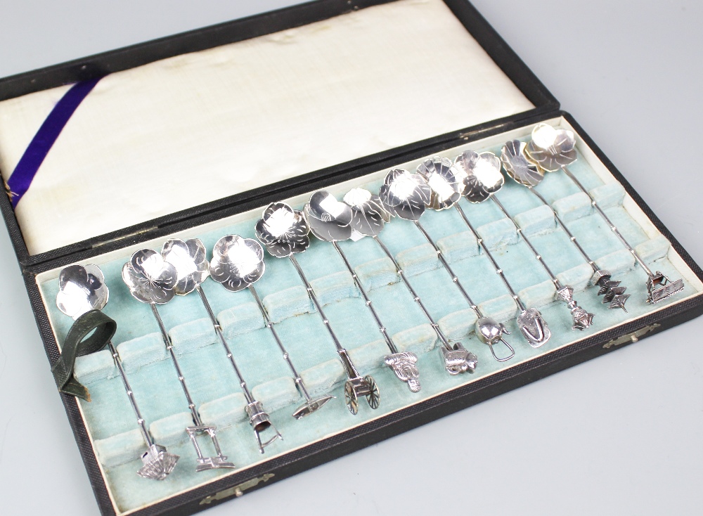 A cased set of twelve Chinese sterling silver teaspoons,