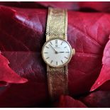 A ladies Omega wristwatch, the circular dial with batons,