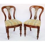 A set of twelve late Victorian walnut dining chairs,