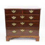 A George III mahogany chest, of two short and three long drawers, on bracket feet,