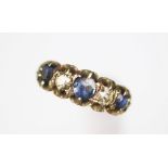 A sapphire and diamond five stone ring in Victorian style setting,