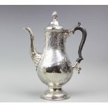 A George III Irish silver coffee pot, Dublin circa 1770, makers mark indistinct,