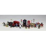 A selection of Dinky and Hornby lead railway station figures, with a Dinky Royal Mail van,