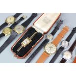 A collection of thirteen gentlemans and ladies wristwatches,