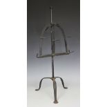 A late 18th century wrought iron lark spit, on tripod base,