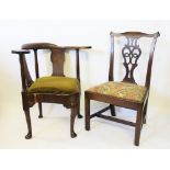 A George III mahogany serpentine corner chair, with solid splats and drop in seat,