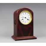 An early 20th century lacquered eight day mantel clock,