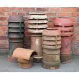 A terracotta chimney pot, 74cm high,