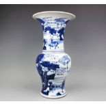 A Chinese porcelain 18th century style blue and white yen yen vase, externally decorated with deer,