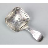A silver caddy spoon, Cocks & Bettridge, Birmingham 1814,