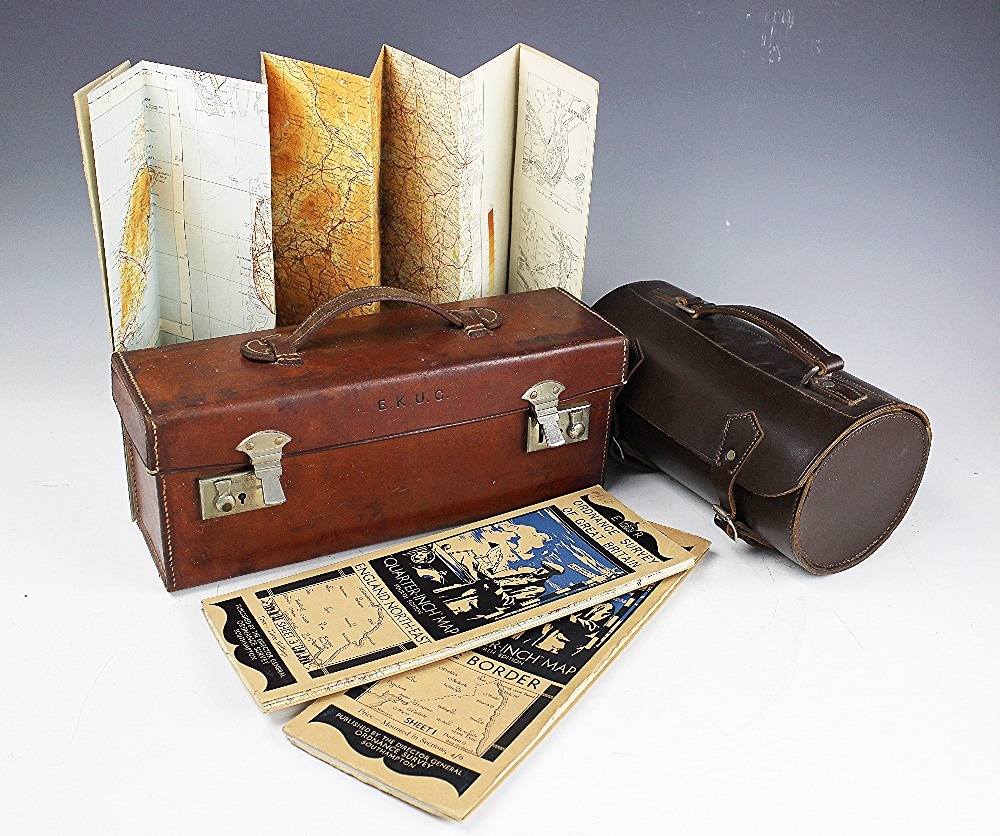 An Army and Navy leather case, enclosing eleven 1930's Ordnance Survey maps of Great Britain,