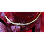 An 18ct yellow gold diamond set collarette/necklace,