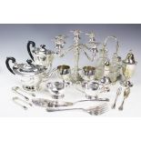 A selection of silver plated items to include a four piece tea service, a four branch candelabrum,