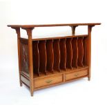 An Edwardian walnut music Canterbury,