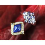 A lapiz lazuli and diamond set 9ct gold ring, of rhombus shape,