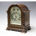 A 1920'S oak eight day mantel clock,