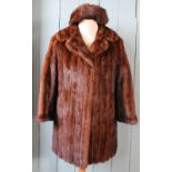 A ladies mink three quarter length coat and matching bonnet (2)