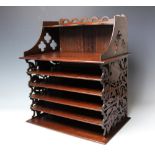 A 19th century mahogany and later open shelving unit,