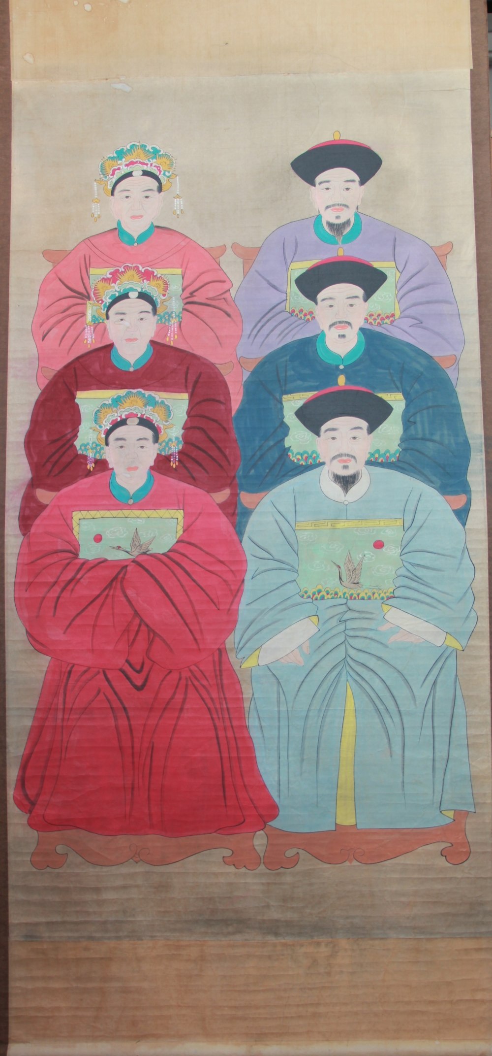 A 19th century Chinese large ancestral 1st rank scroll painting, depicting three males and females,