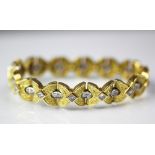 A Stephen Webster 18ct gold and diamond set bracelet, London 1996,