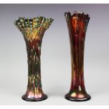 A black carnival glass vase, of flared form with a bark effect design, 27cm high,