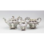 A Victorian silver three piece tea service, Charles Reily and George Storer, London 1842,