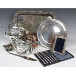 A collection of 19th century silver plated wares, to include a pedestal tea pot, of oval form,