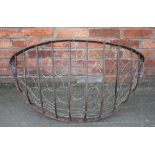 A 19th century wrought iron hay feeder,