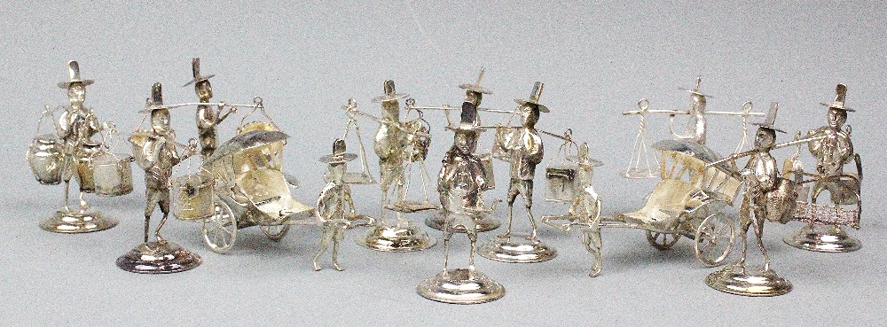 A set of eight sterling silver Chinese miniature figural menu holders,