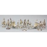 A set of eight sterling silver Chinese miniature figural menu holders,