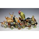 A collection of assorted Beswick animals and birds, to include; Pigeon 1383, Kingfisher,