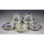 Five 18th century French tin glazed earthenware Faience style plates titled and dated,