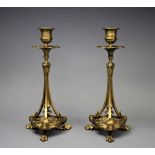 A pair of 19th century gilt metal candlesticks, of elaborate form,