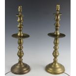 A pair of late 20th century brass table lamps, modelled as Heemskerk candlesticks,